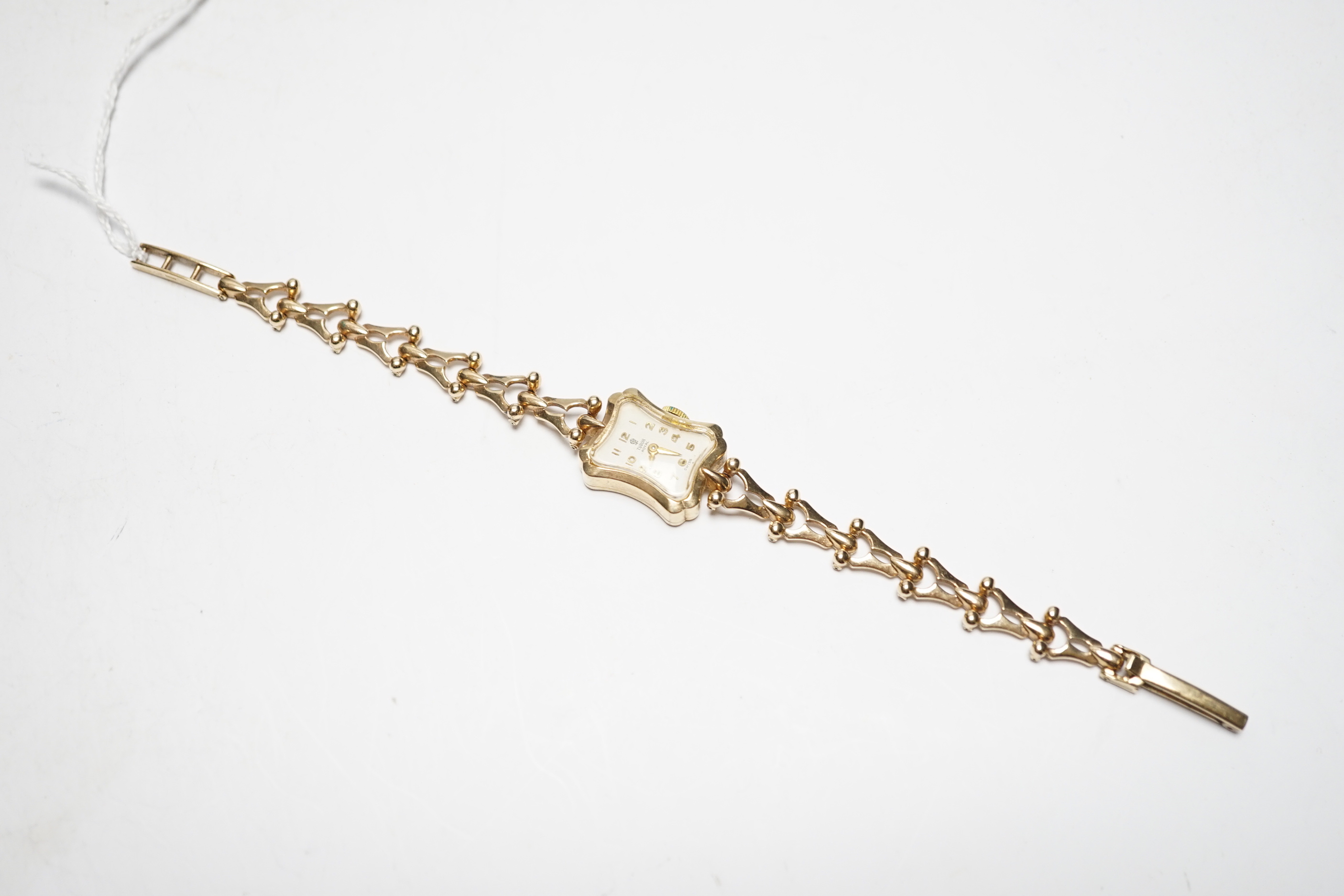 A lady's late 1960's 9ct gold Tudor Royal manual wind wrist watch, on an associated 9ct gold bracelet, overall 18cm, gross weight 18.6 grams.